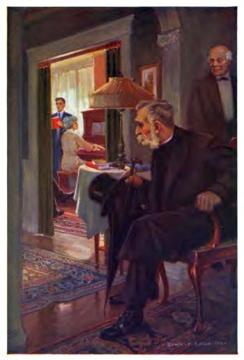 man in black with grey moustache and whiskers seated with woman playing piano and man standing next to her in next room